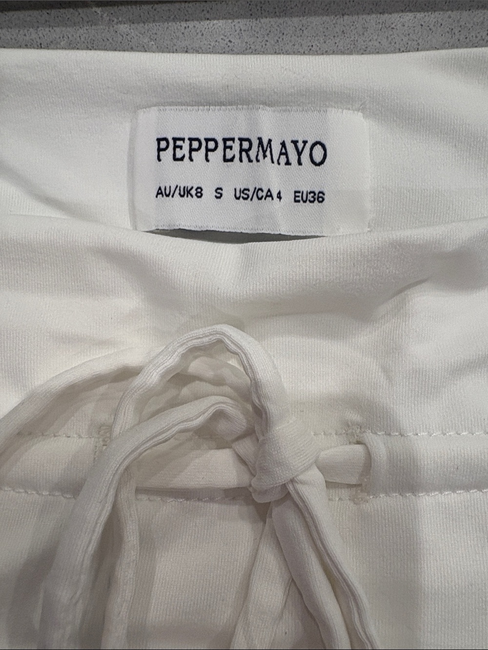 Peppermayo White Ruffle Mini Skirt with Drawstring - Picture 2 of 4